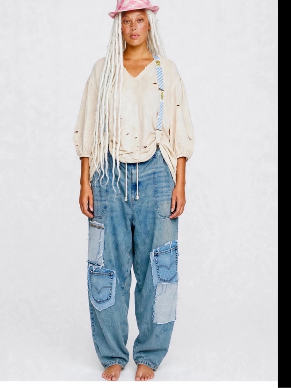 CRAM wide leg jeans with suspenders.